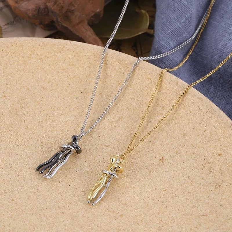 Couple Hugging Necklace